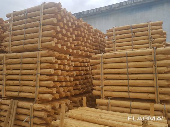 Posts and poles, debarked, machine rounded